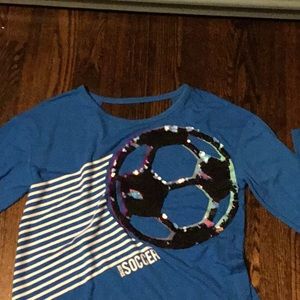 Blue justice soccer open back long sleeve shirt